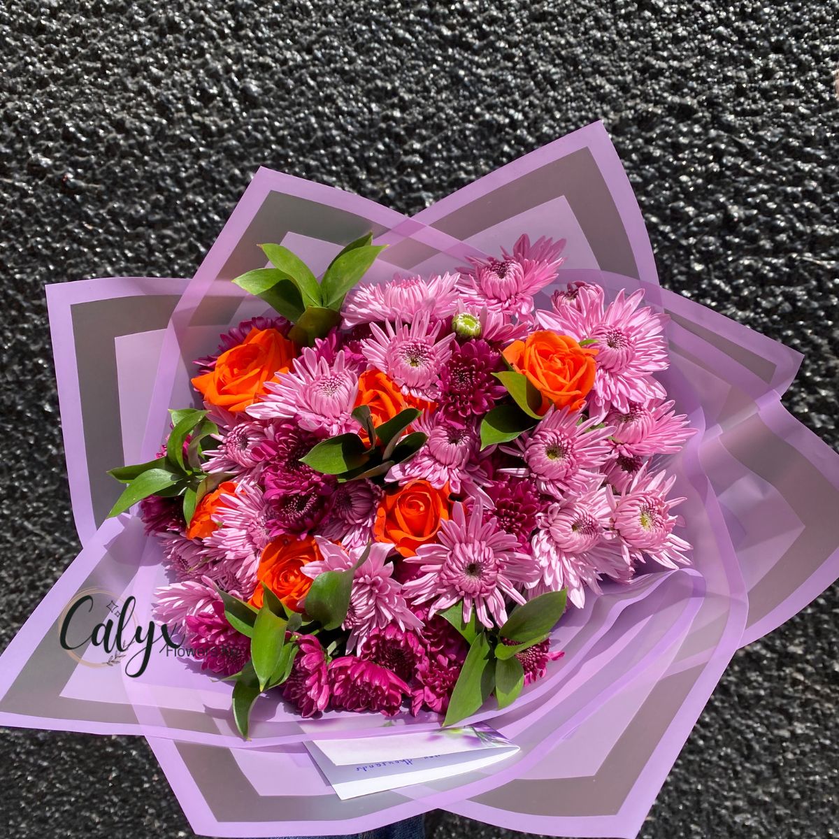 Purple Chrysanthemums & orange roses