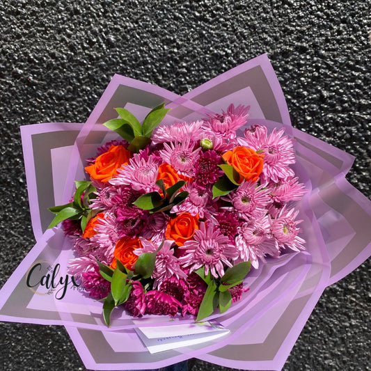 Purple Chrysanthemums & orange roses